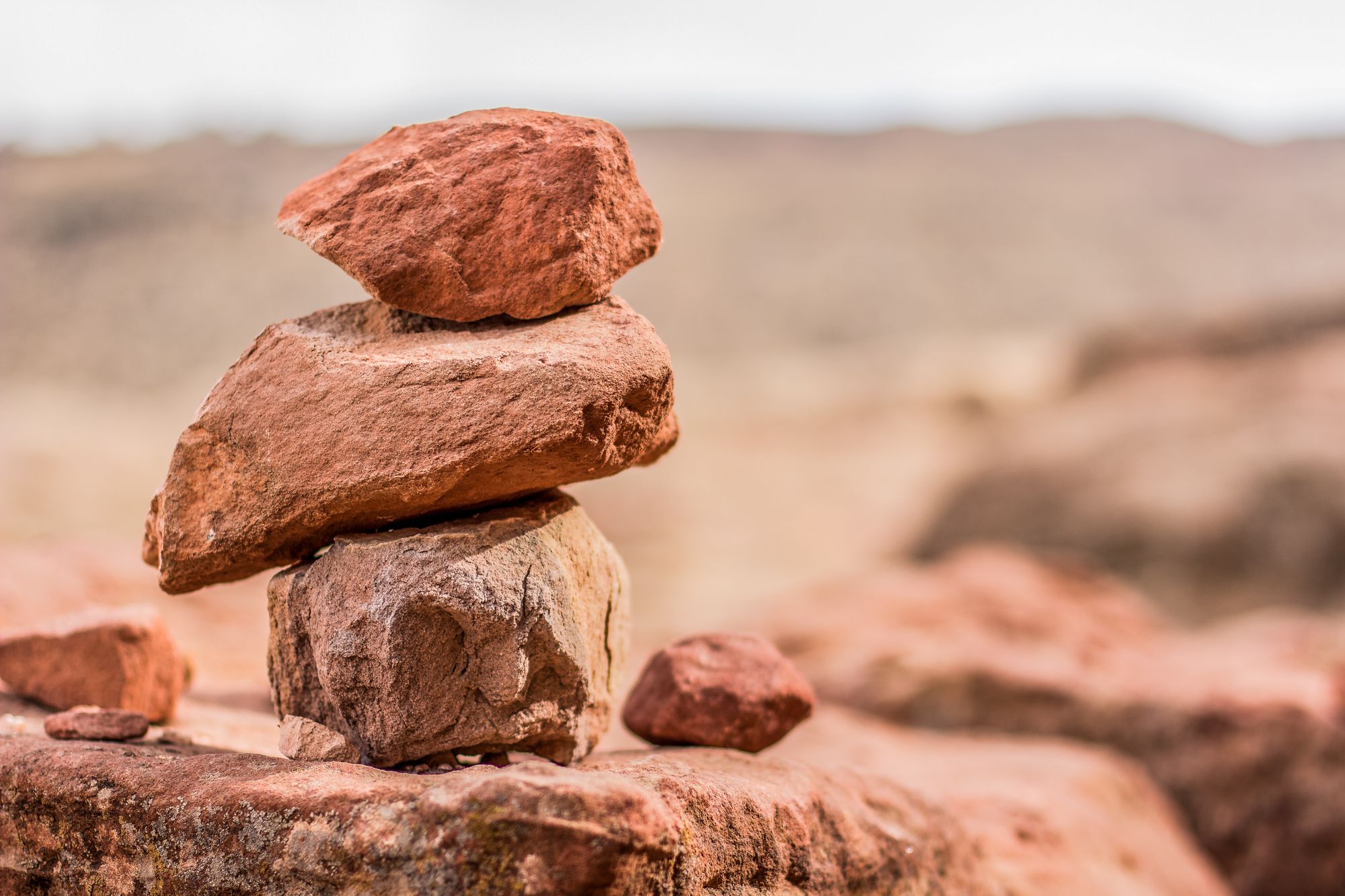 A picture of three rocks, stacked.